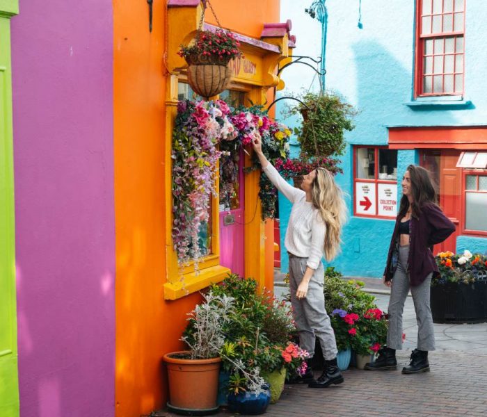 couple paying a visit to the colourful shops of Kinsale Co Cork